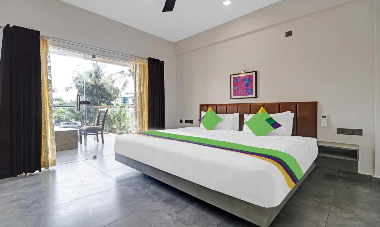 Treebo Grand Vistara Airport Suites Kochi Exteriör bild